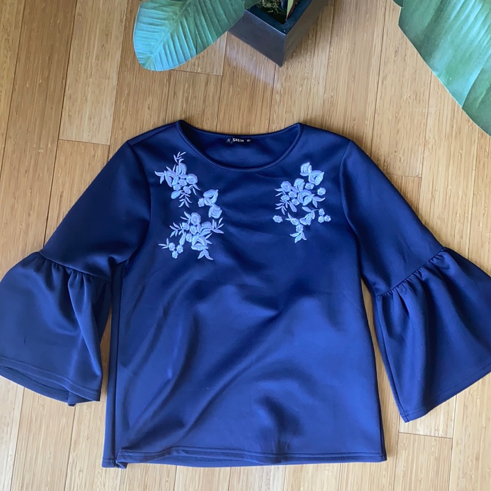 Flare sleeve appliqué top